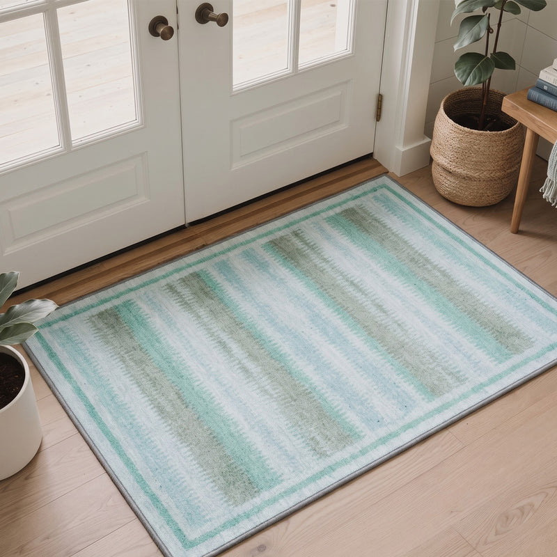 Colvia Washable Coastal Striped Light Blue Rug 3x5 placed at a welcoming front door entryway