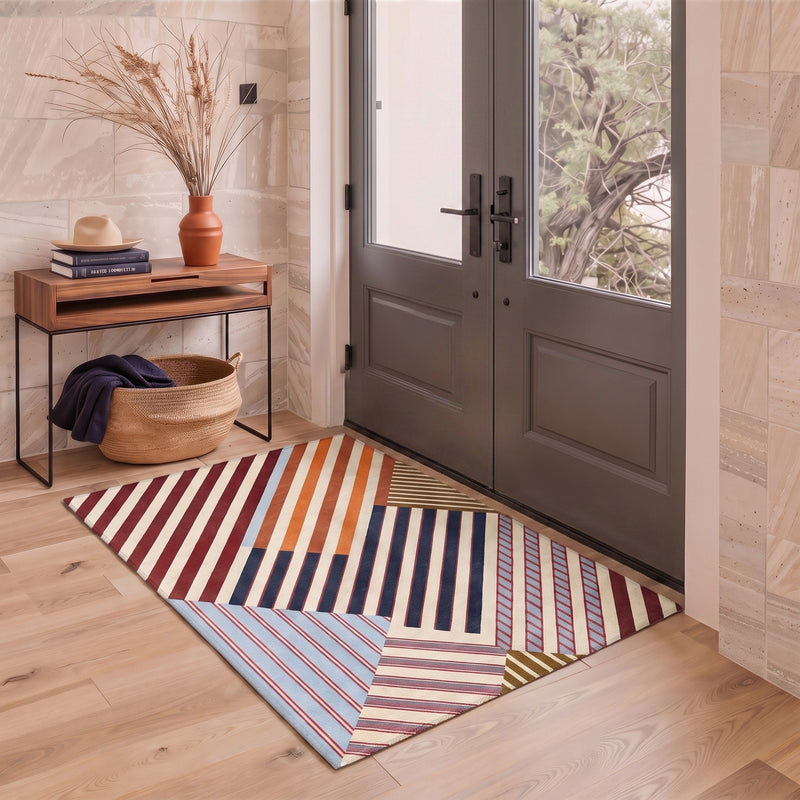 Stria Washable Modern Diagonal Striped Multicolor Rug 3x5 placed at a welcoming front door entryway
