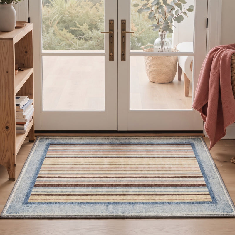 Virela Washable Modern Striped Beige Rug 3x5 placed at a welcoming front door entryway