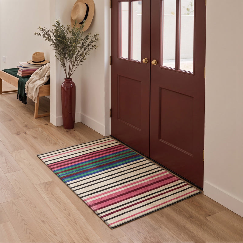 Wovela Washable Modern Striped Beige Rug 3x5 placed at a welcoming front door entryway